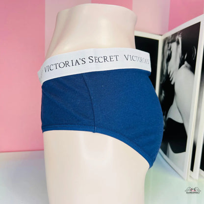 Modré spodní prádlo Victoria’s Secret s bílým elastickým pasem.